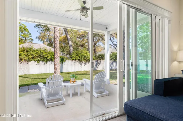 a room with furniture and a large window