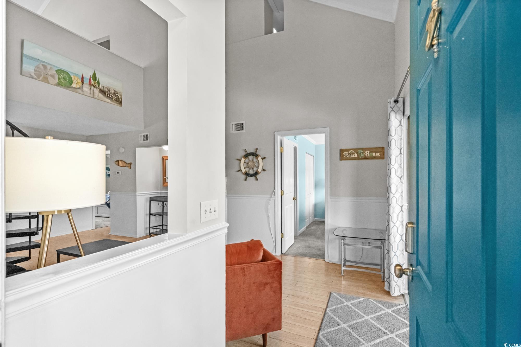 1356 Glenns Bay Road, Unit 203D Surfside Beach, SC 29575 - Photo 2 of 38 Entrance foyer with wood finished floors and high vaulted ceiling