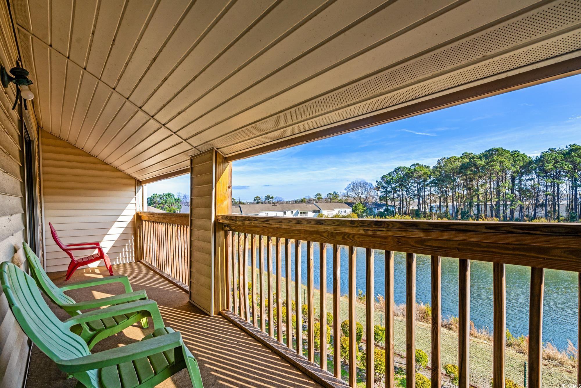 1356 Glenns Bay Road, Unit 203D Surfside Beach, SC 29575 - Photo 26 of 38 Balcony with a water view