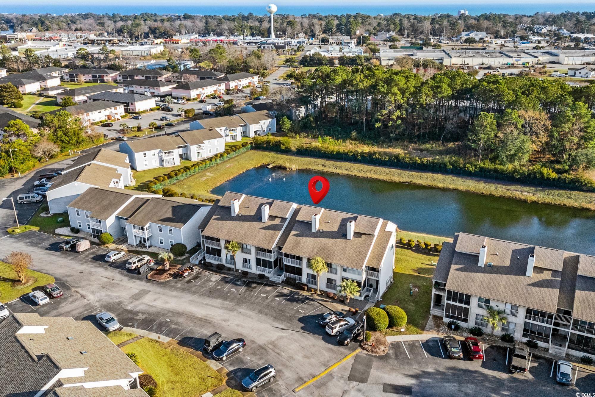 1356 Glenns Bay Road, Unit 203D Surfside Beach, SC 29575 - Photo 33 of 38 Drone / aerial view of a nearby body of water