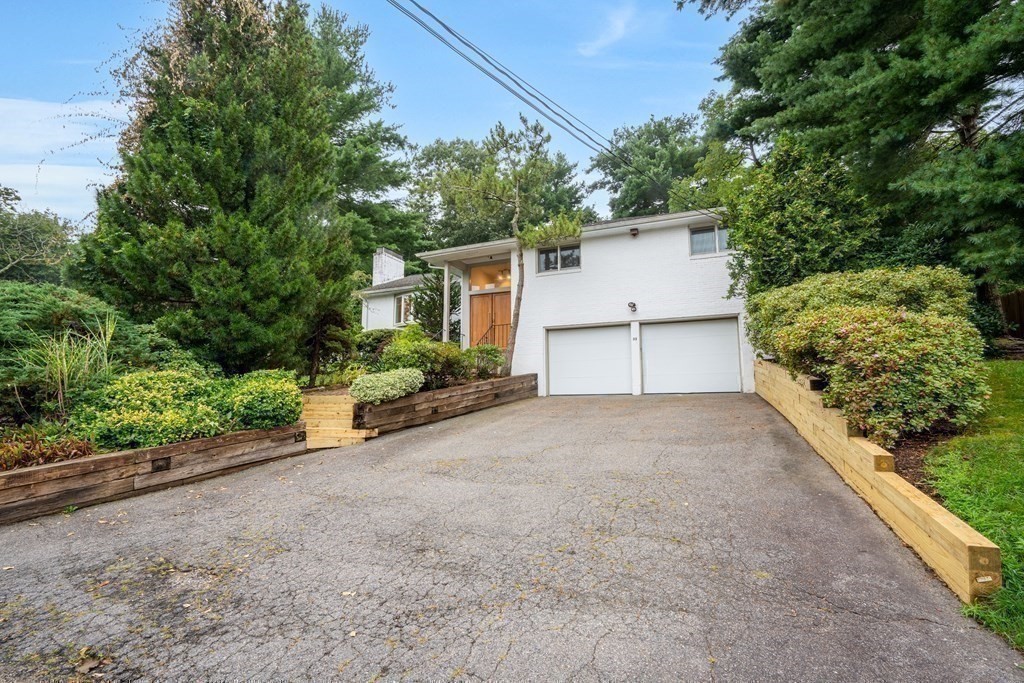 33 Sky View Circle Newton, MA 02459 - Photo 21 of 42 front view of a house with a street