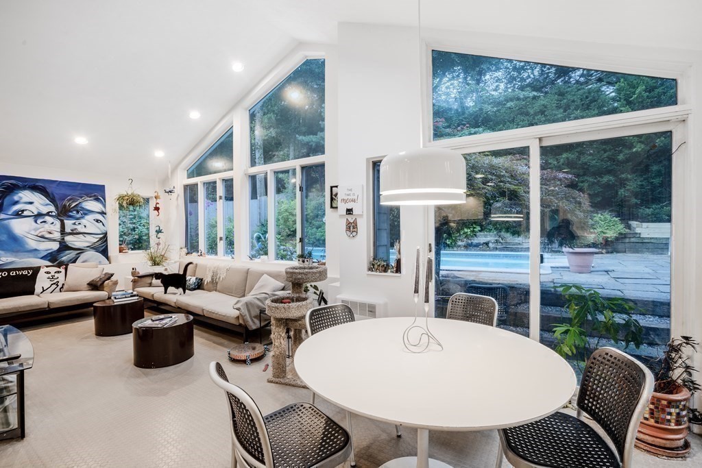 33 Sky View Circle Newton, MA 02459 - Photo 3 of 42 a living room with furniture and a floor to ceiling window