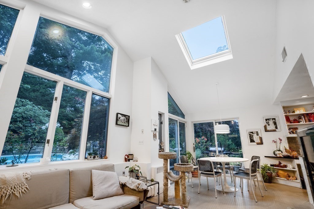 33 Sky View Circle Newton, MA 02459 - Photo 40 of 42 a living room with furniture and a large window
