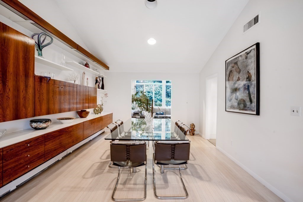33 Sky View Circle Newton, MA 02459 - Photo 5 of 42 a room with dining table and chairs