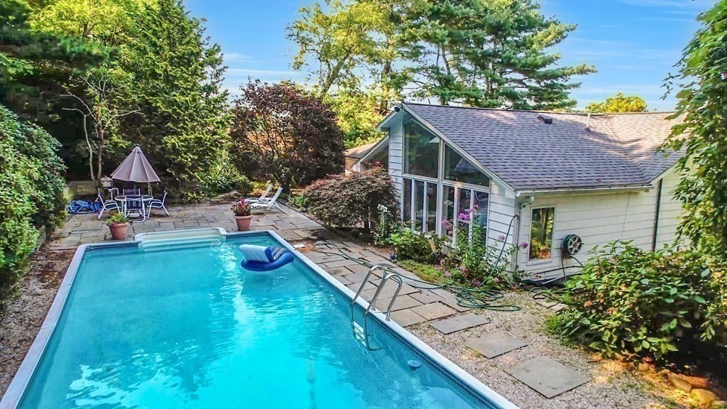 33 Sky View Circle Newton, MA 02459 - Photo 7 of 42 a view of swimming pool with sitting area