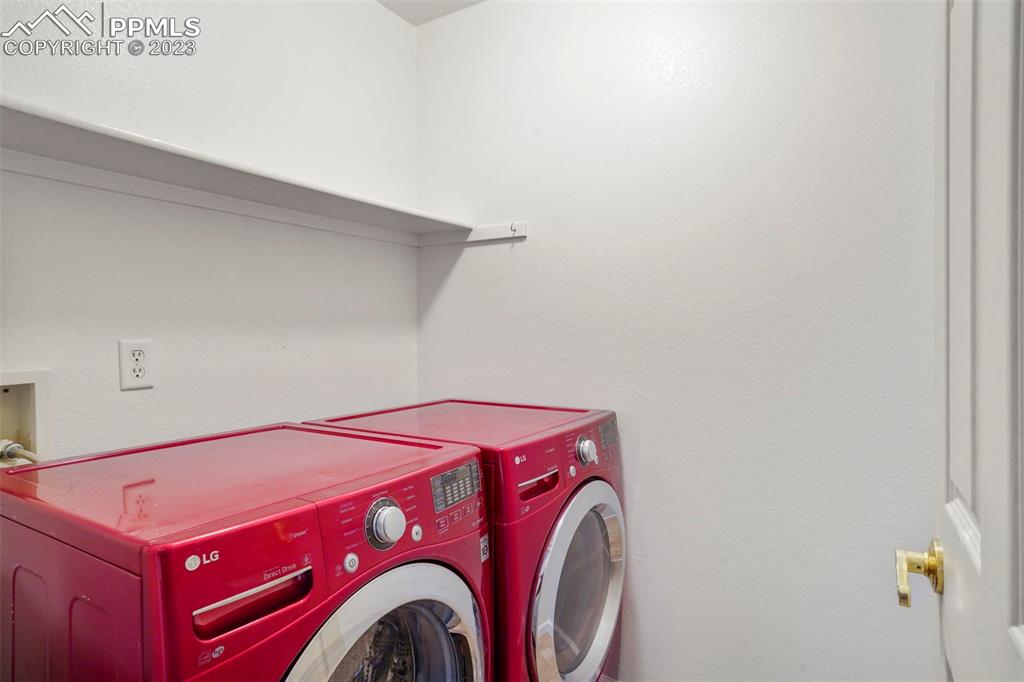 4748 Brant Road Colorado Springs, CO 80911 - Photo 16 of 19 a utility room with dryer and washer