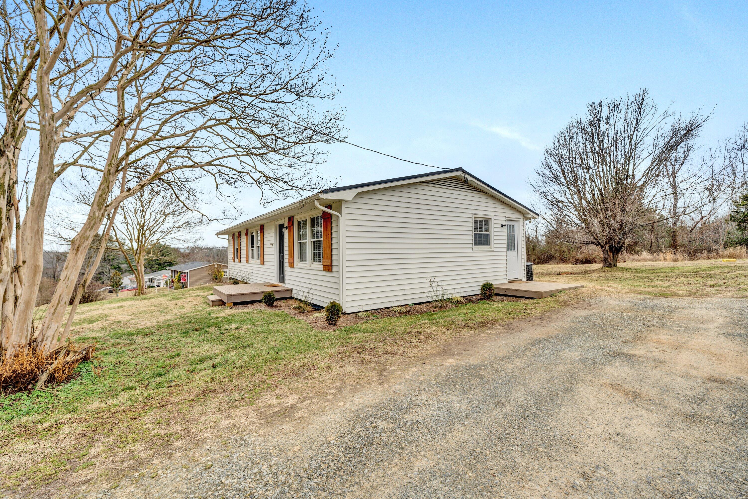 1465 Hardy Road Hardy, VA 24101 - Photo 4 of 32 a view of a house with a yard