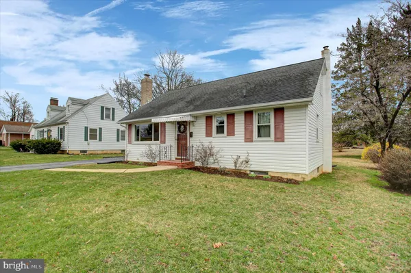 a view of a house with a big yard