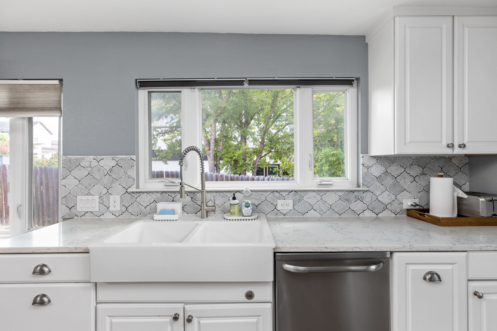 7611 Providence Avenue, Unit A Austin, TX 78752 - Photo 15 of 40 a kitchen with a sink and large window