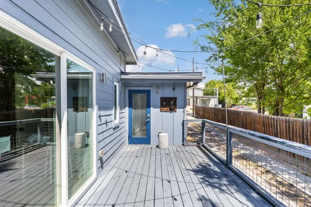 a view of a living room and entry way