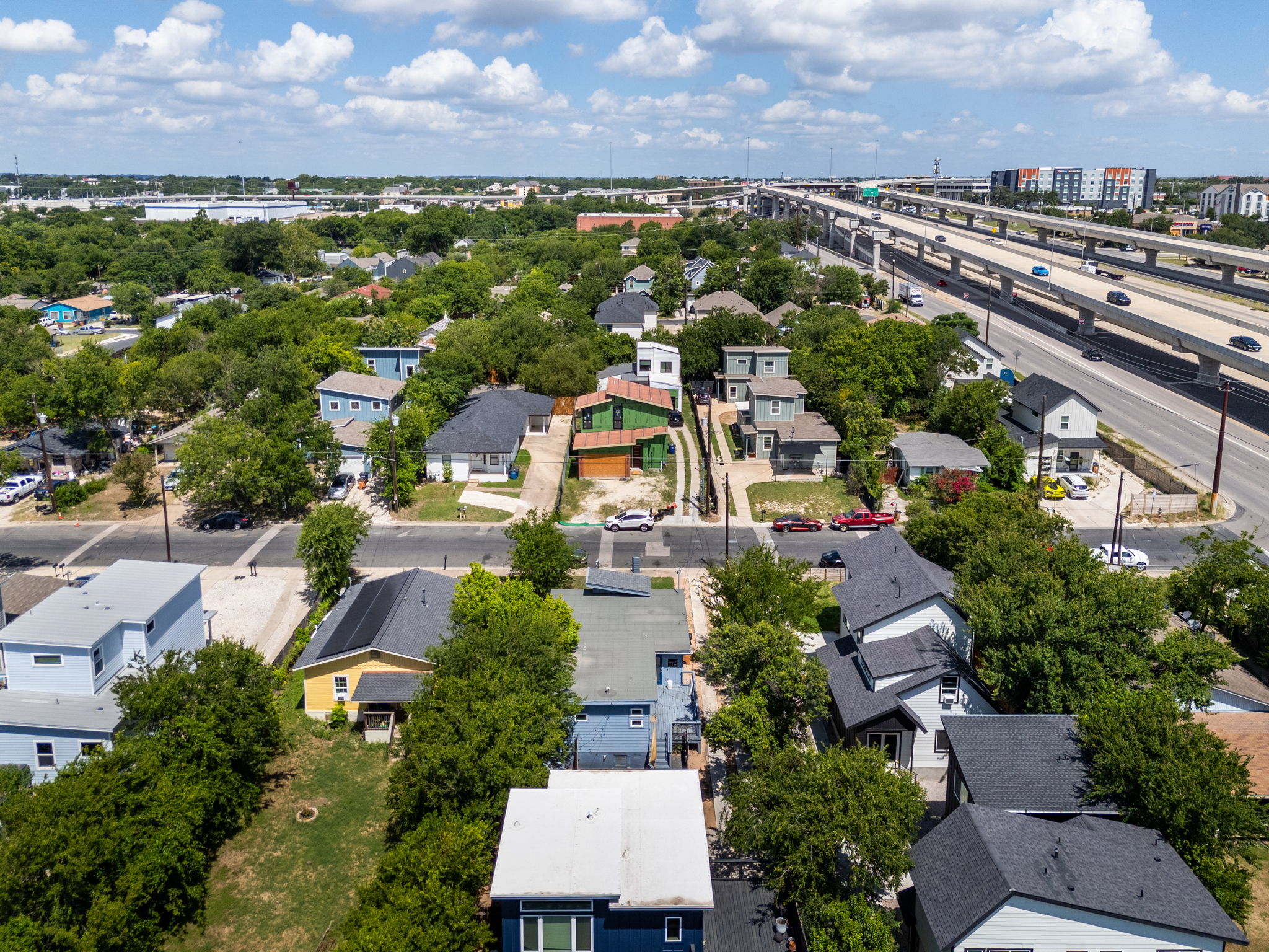 7611 Providence Avenue, Unit A Austin, TX 78752 - Photo 39 of 40 an aerial view of residential houses with outdoor space and a building