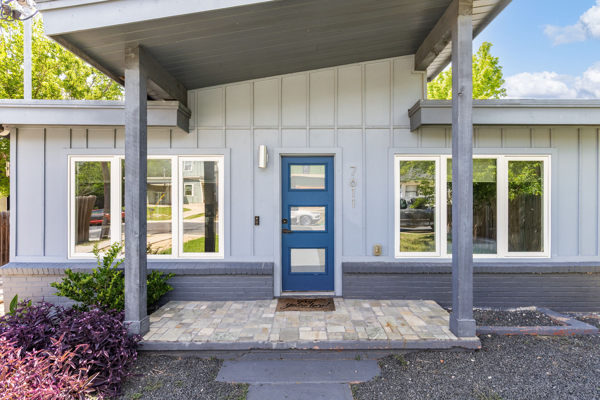 7611 Providence Avenue, Unit A Austin, TX 78752 - Photo 5 of 40 a view of a brick house with front door