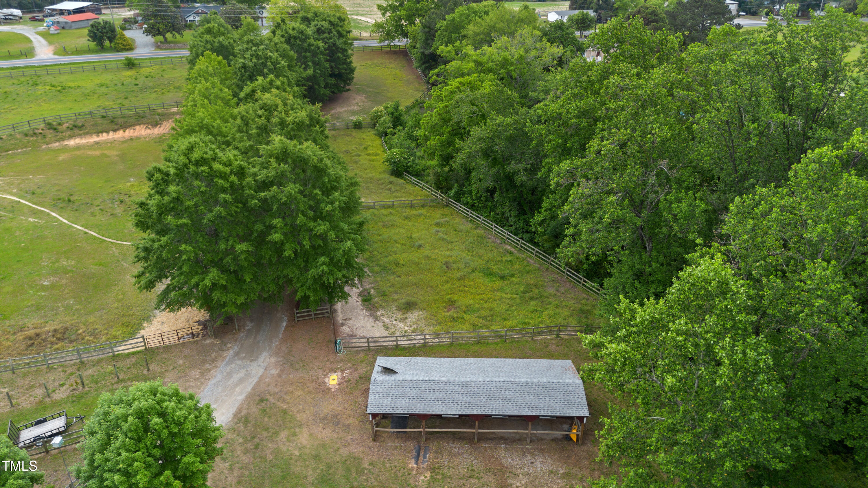5237 Christian Light Road Fuquay-Varina, NC 27526 - Photo 52 of 56 drone shedrow and front pastures