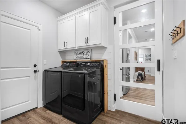 a view of entryway with wooden floor