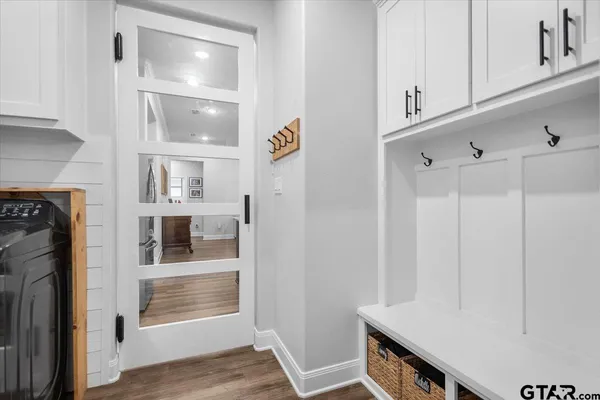 a view of kitchen with furniture and wooden floor