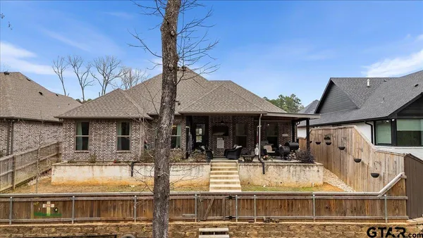 front view of a house with large windows