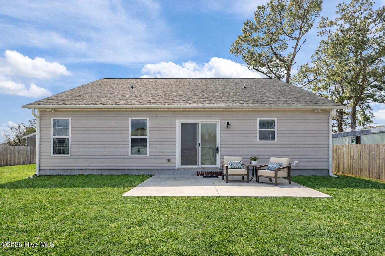 621 West Beaufort Road Beaufort, NC 28516 - Photo 32 of 38 Back Patio Staged by AI