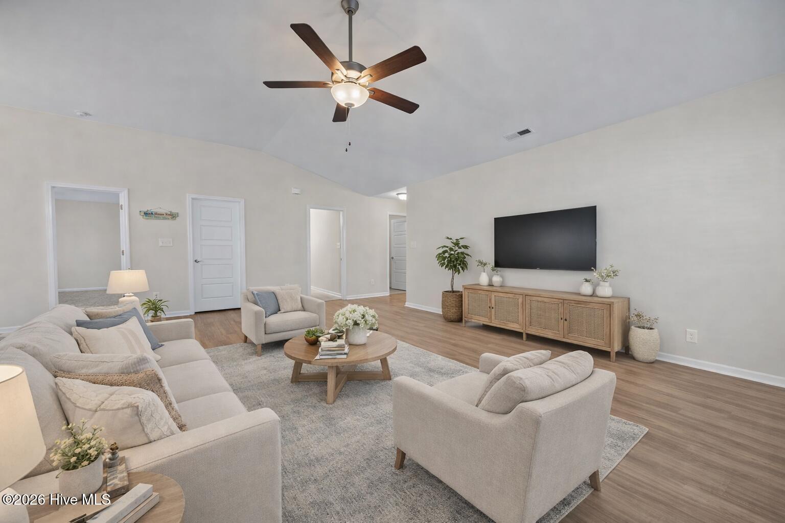 621 West Beaufort Road Beaufort, NC 28516 - Photo 3 of 38 Living Room Staged by AI