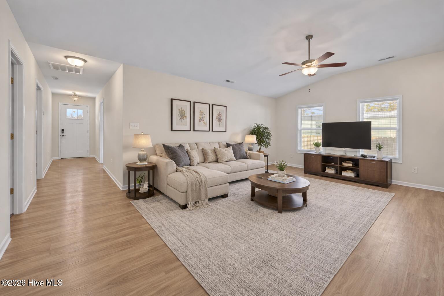 621 West Beaufort Road Beaufort, NC 28516 - Photo 5 of 38 Living Room Staged with AI