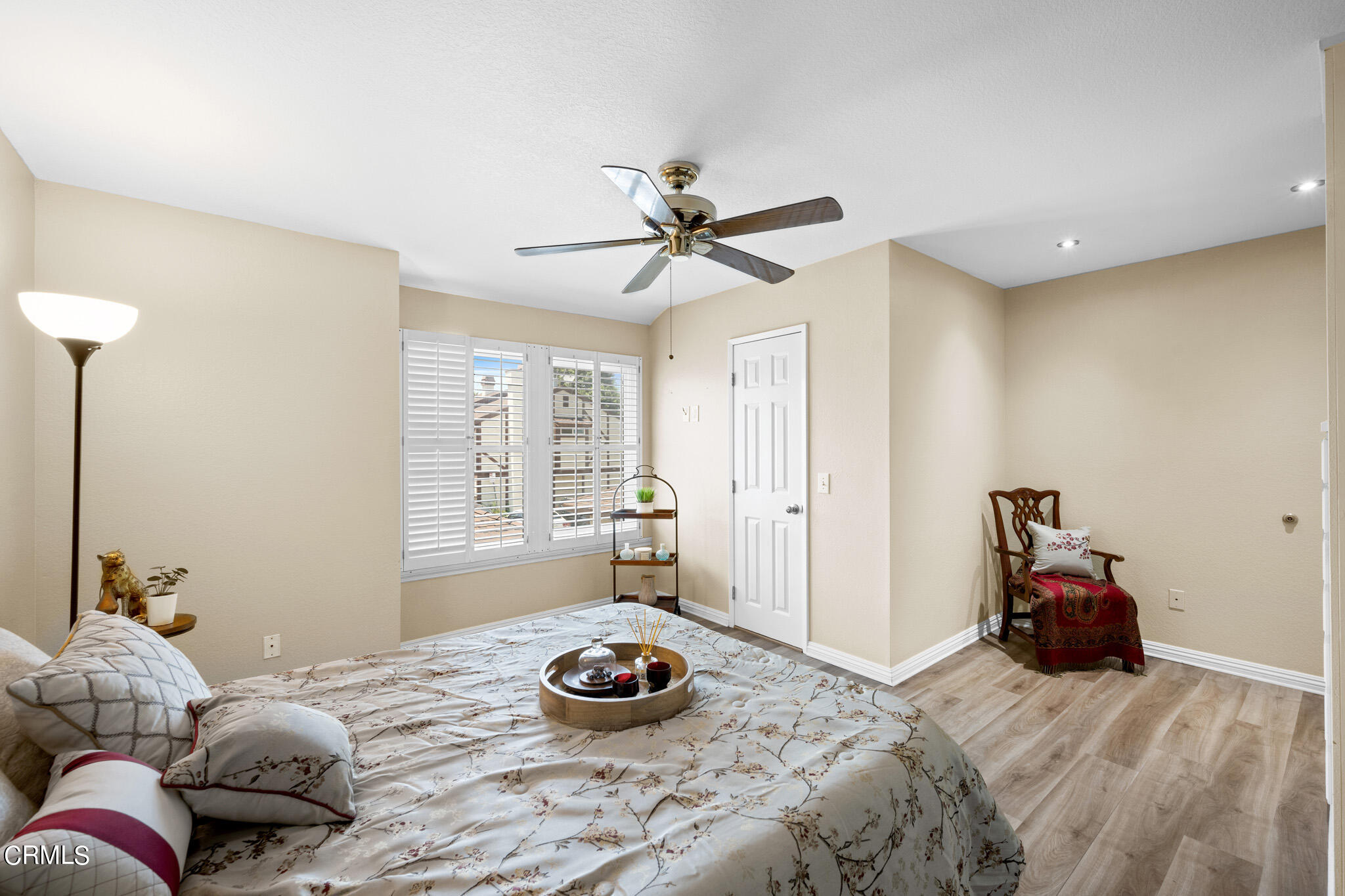 2041 Windsor Circle Duarte, CA 91010 - Photo 11 of 19 a bedroom with a bed and a chandelier