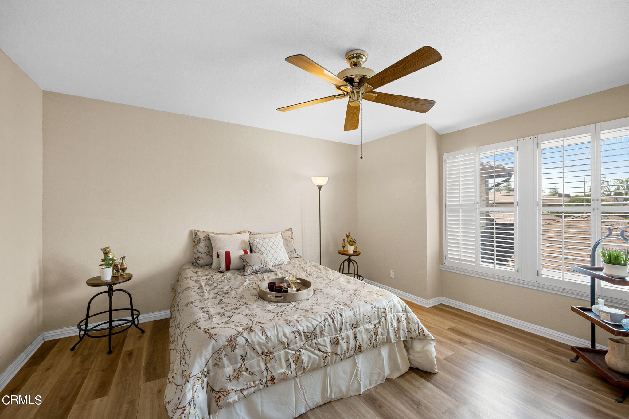 2041 Windsor Circle Duarte, CA 91010 - Photo 13 of 19 a bedroom with a bed and a chandelier