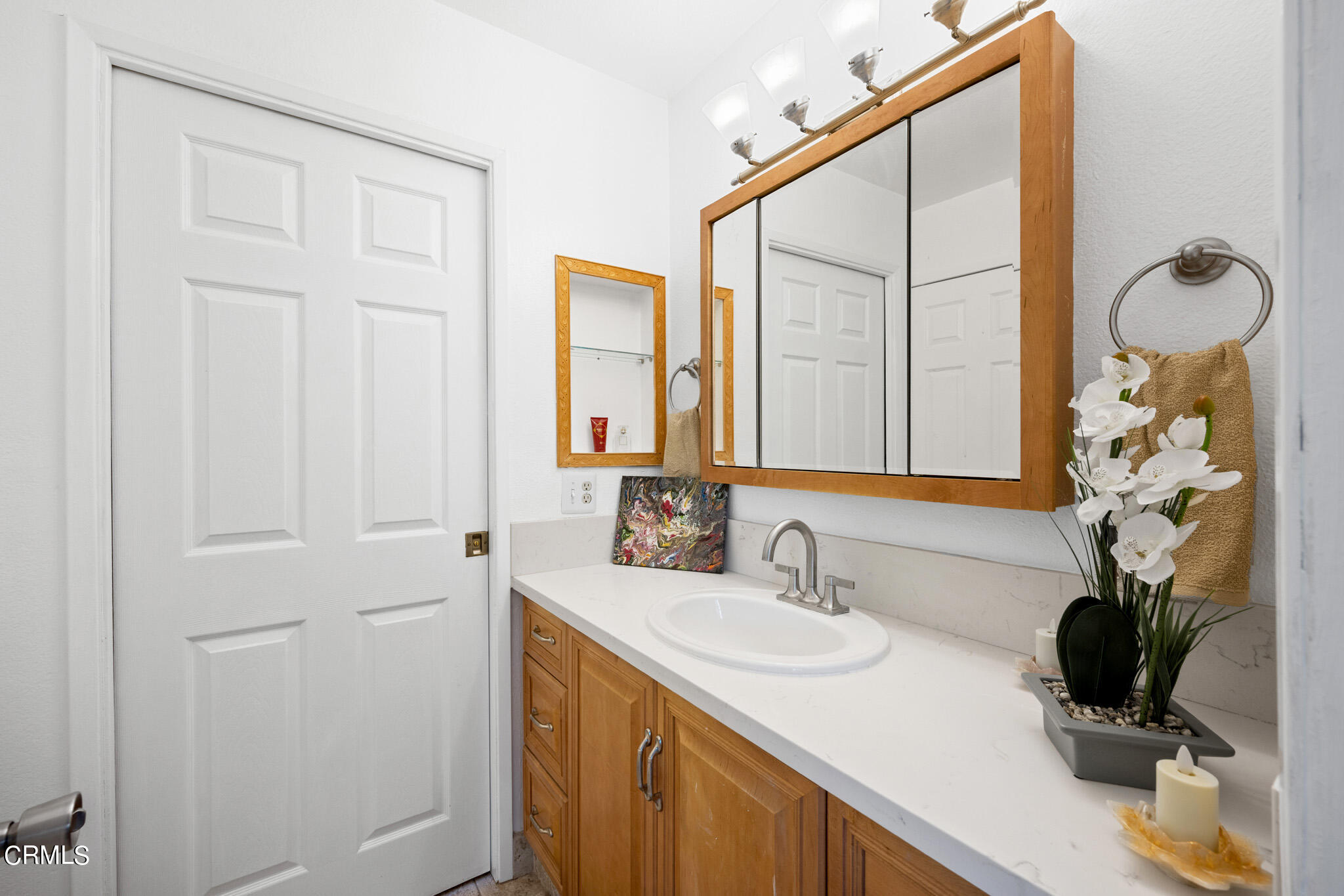 2041 Windsor Circle Duarte, CA 91010 - Photo 16 of 19 a bathroom with a sink and a mirror