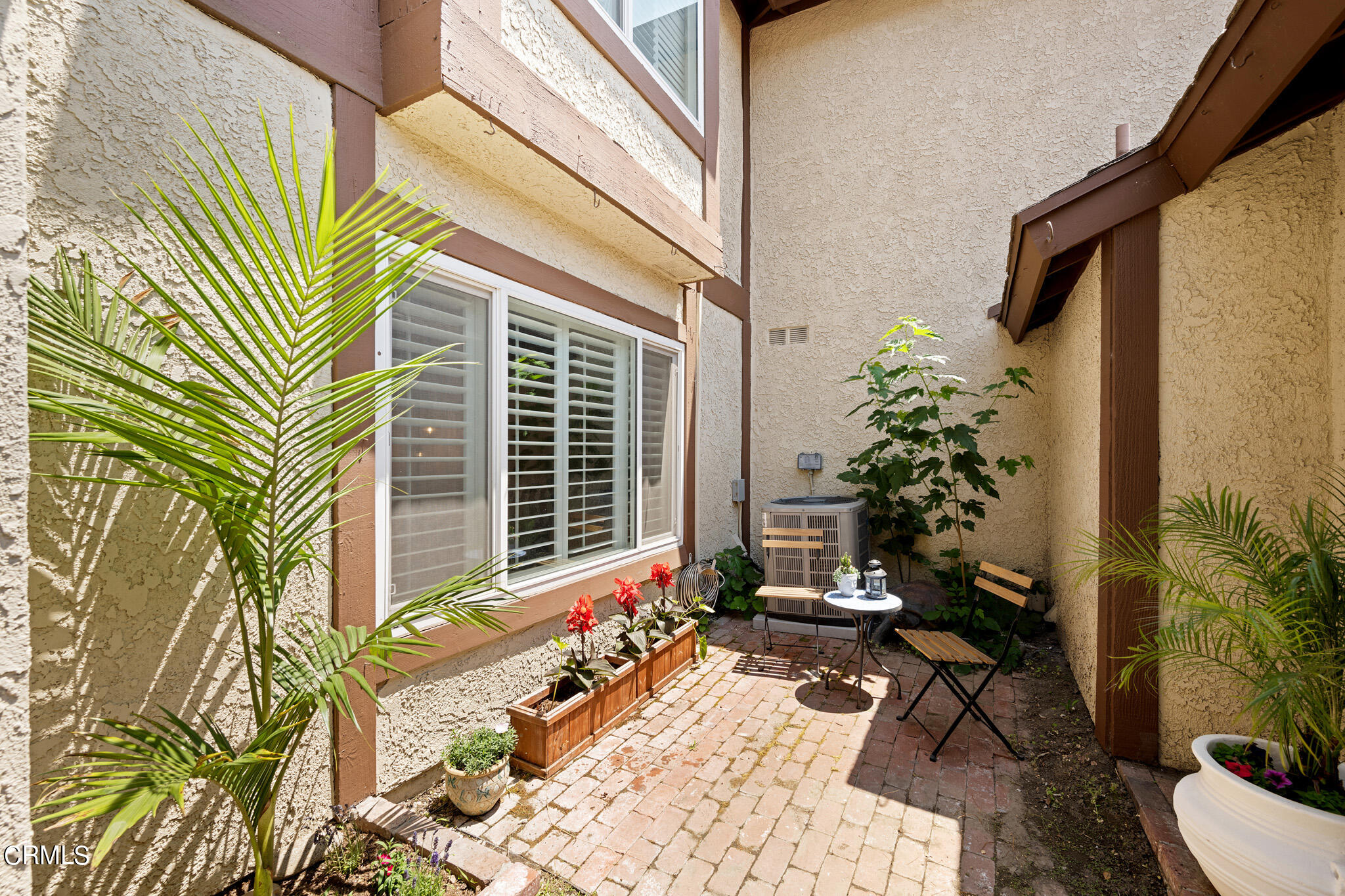 2041 Windsor Circle Duarte, CA 91010 - Photo 2 of 19 a view of a porch with chairs and potted plants