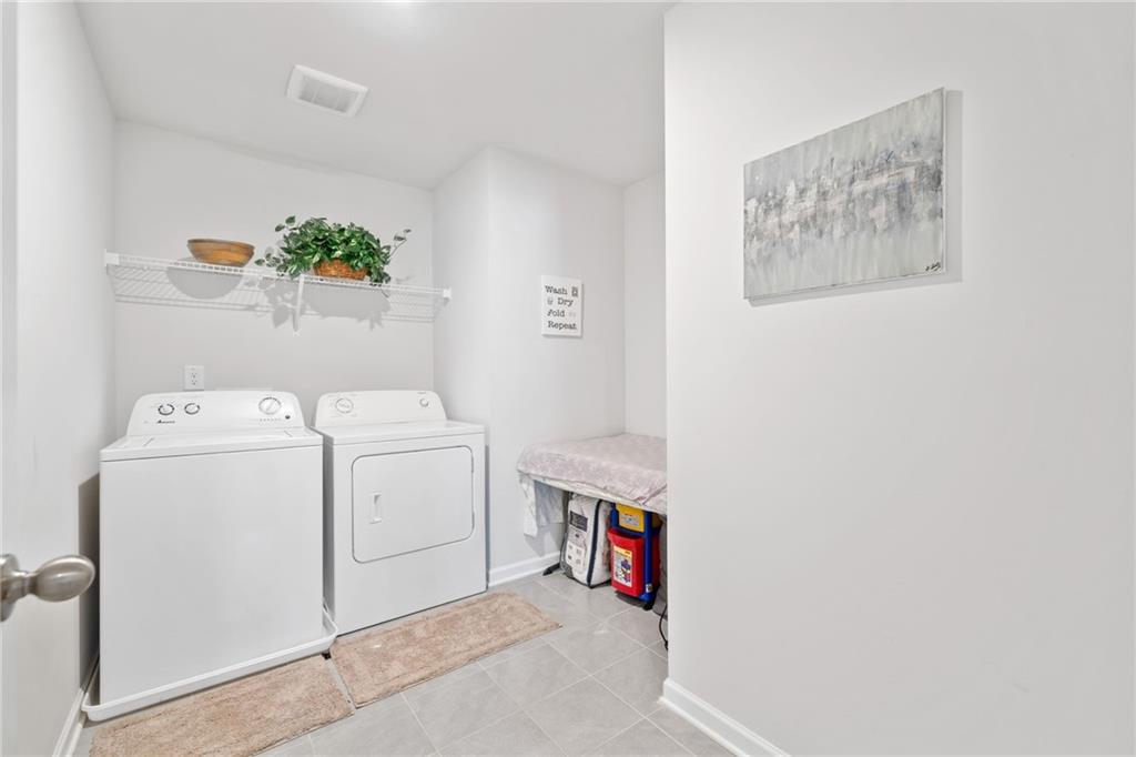 368 Murray Way Lilburn, GA 30047 - Photo 34 of 54 a utility room with dryer and washer