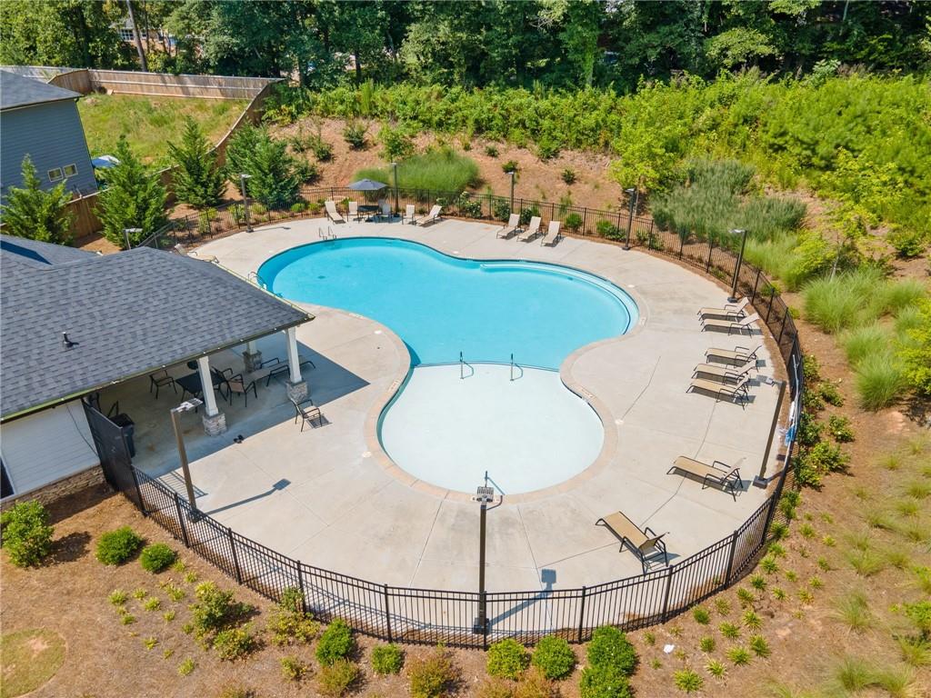 368 Murray Way Lilburn, GA 30047 - Photo 47 of 54 a view of a swimming pool with a patio