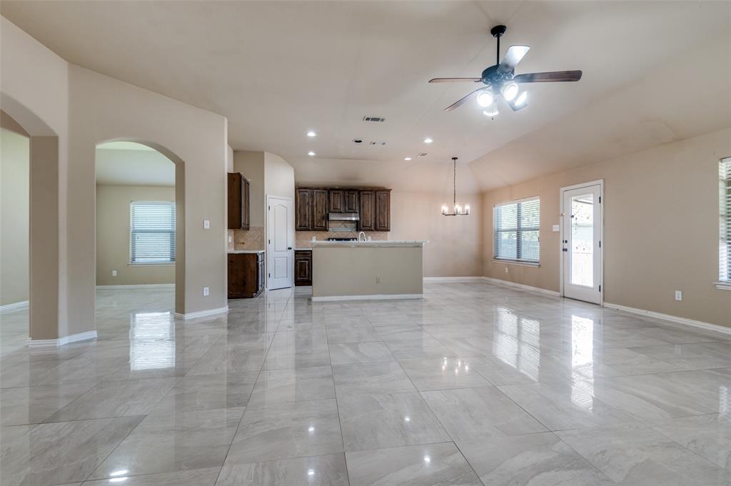 1615 Ridgemar Drive Grand Prairie, TX 75051 - Photo 14 of 25 a view of a kitchen with a sink and a large window