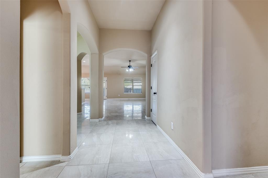 1615 Ridgemar Drive Grand Prairie, TX 75051 - Photo 3 of 25 a bathroom with a glass door shower
