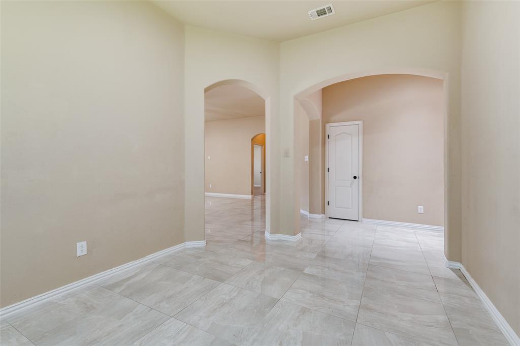 1615 Ridgemar Drive Grand Prairie, TX 75051 - Photo 10 of 25 a view of an empty room