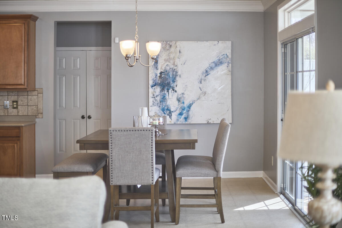 442 Steel Hopper Way Garner, NC 27529 - Photo 14 of 45 a dining room with furniture and window