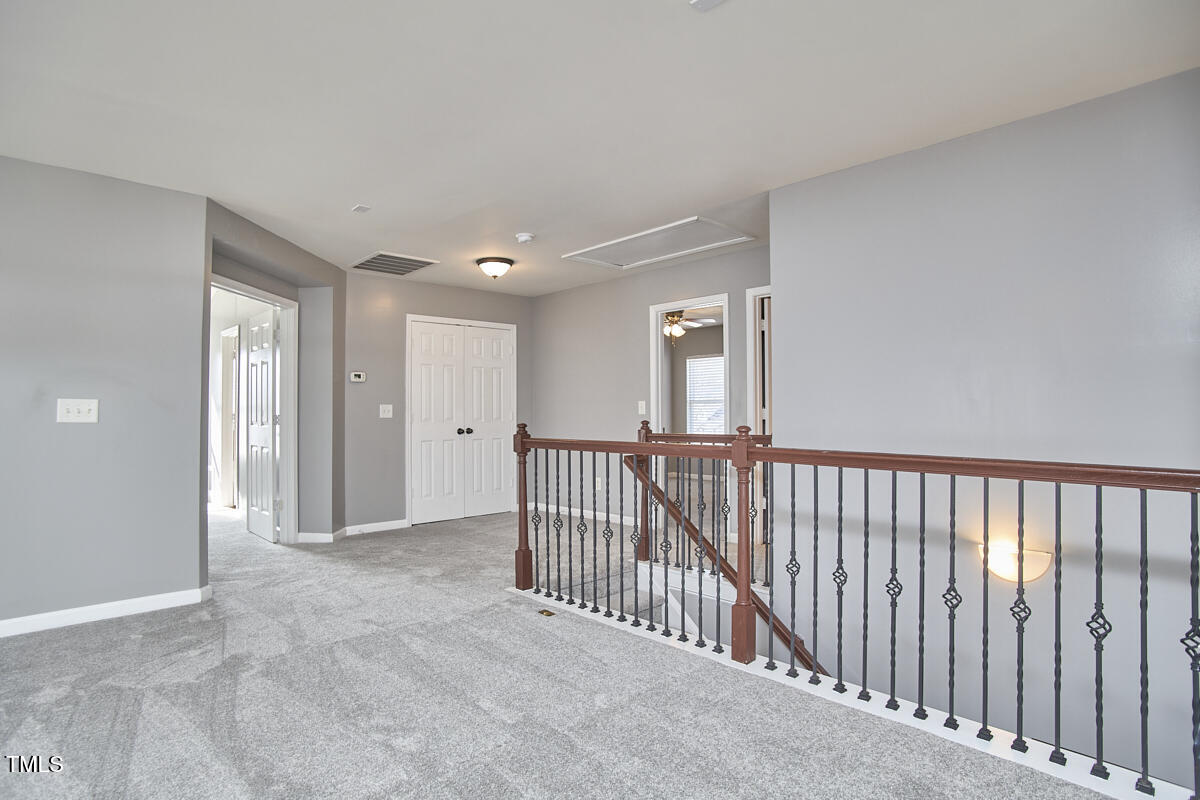 442 Steel Hopper Way Garner, NC 27529 - Photo 22 of 45 a view of a hallway