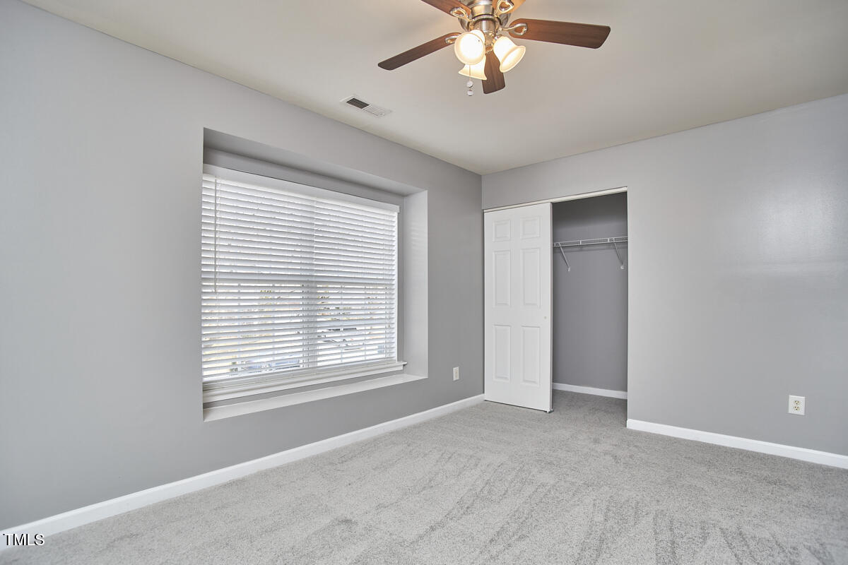 442 Steel Hopper Way Garner, NC 27529 - Photo 37 of 45 a view of an empty room with a window