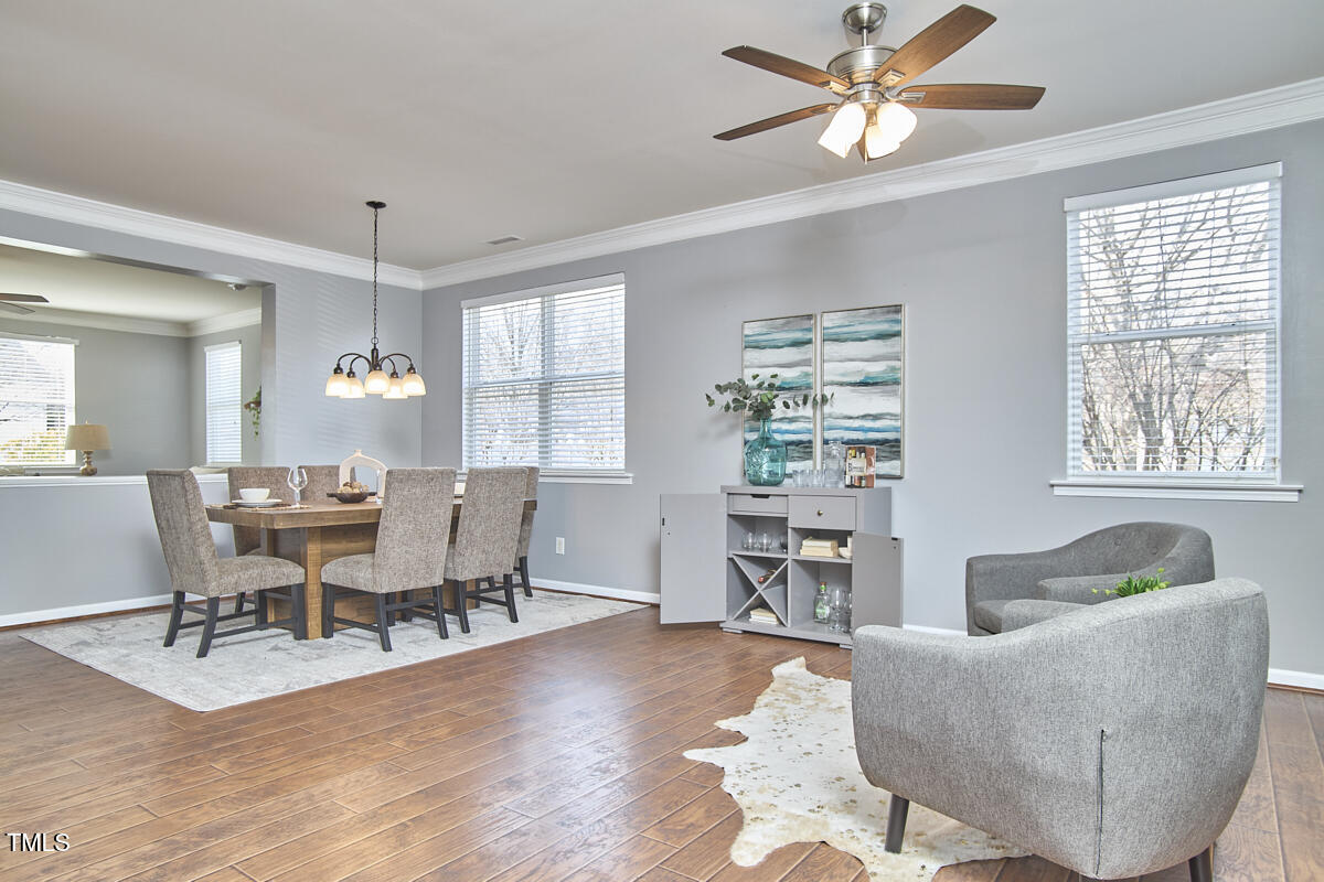 442 Steel Hopper Way Garner, NC 27529 - Photo 4 of 45 a living room with furniture and a large window
