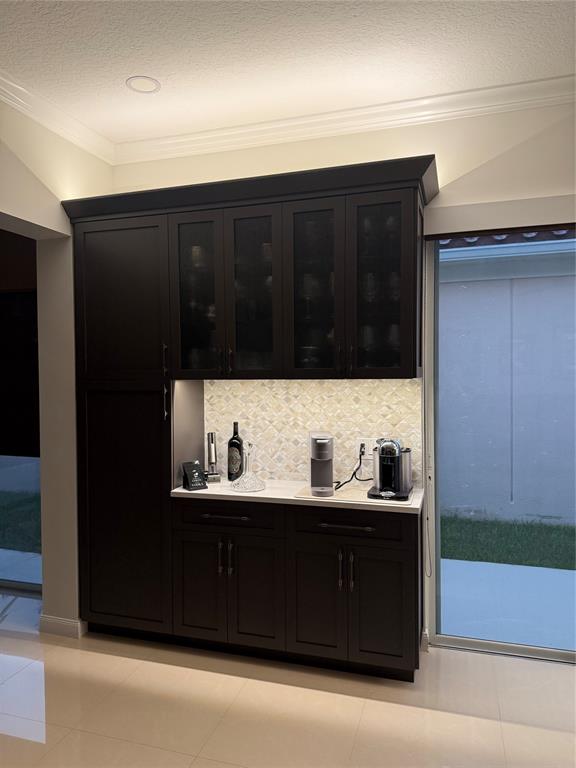 2752 Irma Lake Drive West Palm Beach, FL 33411 - Photo 14 of 38 a kitchen with a sink and cabinets