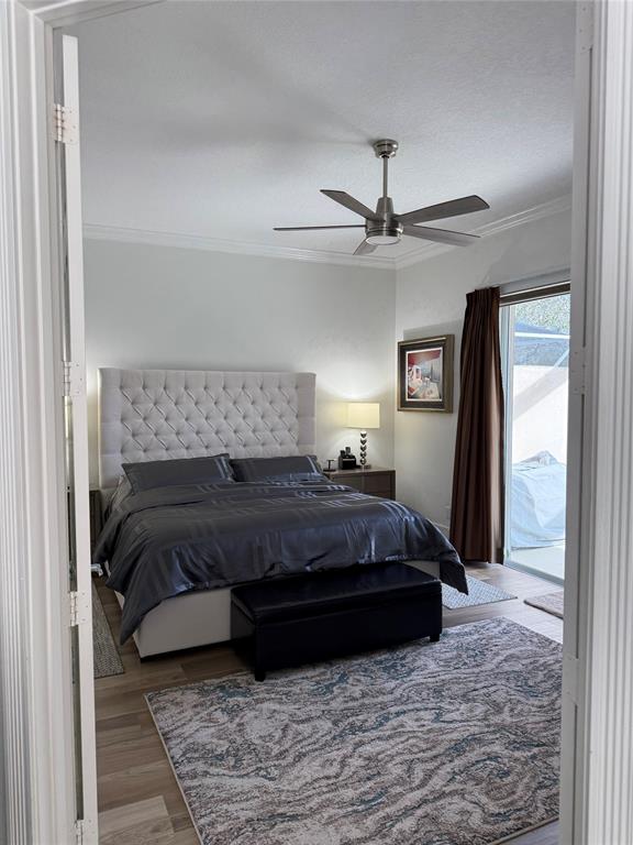 2752 Irma Lake Drive West Palm Beach, FL 33411 - Photo 19 of 38 a room with a bed and a chandelier