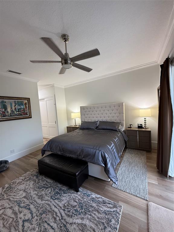 2752 Irma Lake Drive West Palm Beach, FL 33411 - Photo 21 of 38 a living room with a bed furniture and a ceiling fan