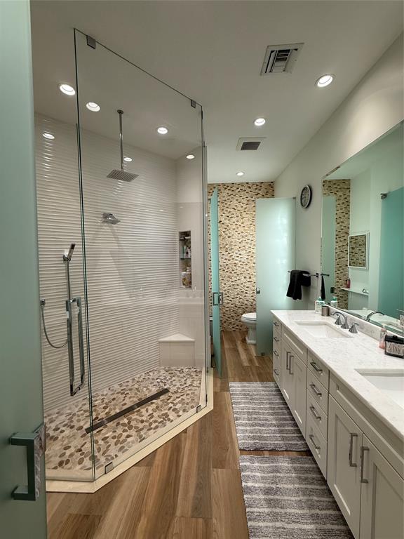 2752 Irma Lake Drive West Palm Beach, FL 33411 - Photo 24 of 38 a bathroom with a double vanity sink and a mirror