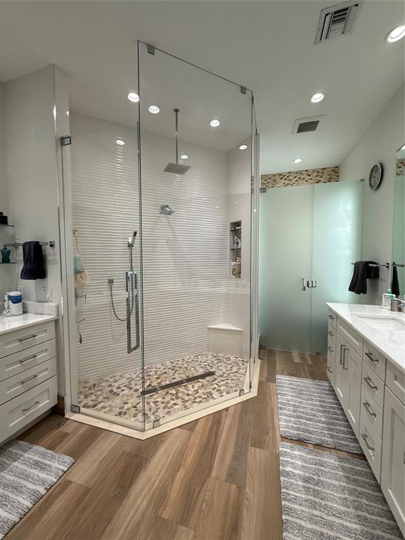 2752 Irma Lake Drive West Palm Beach, FL 33411 - Photo 28 of 38 a bathroom with a glass shower sink and mirror