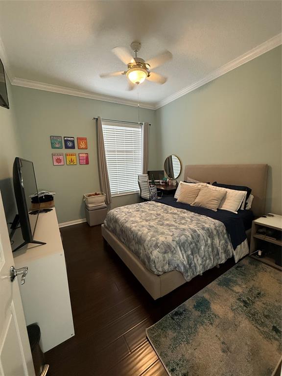 2752 Irma Lake Drive West Palm Beach, FL 33411 - Photo 29 of 38 a bedroom with a bed and a chandelier