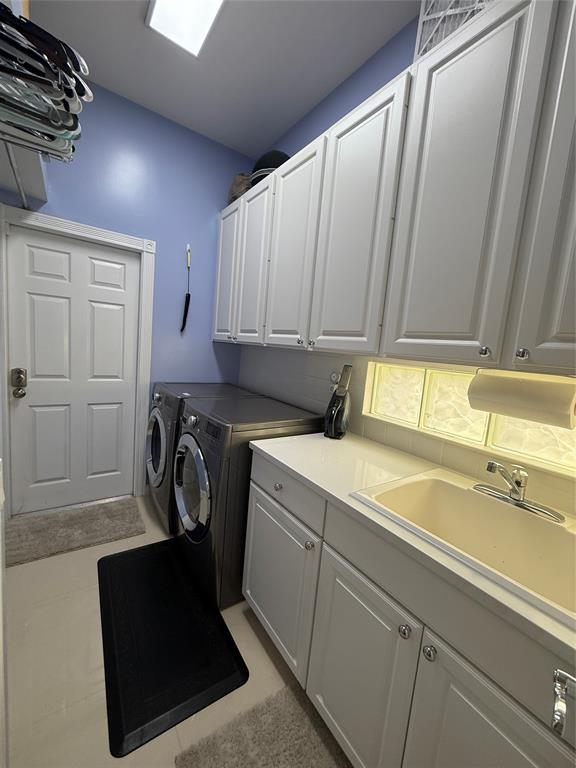 2752 Irma Lake Drive West Palm Beach, FL 33411 - Photo 32 of 38 a utility room with dryer and washer