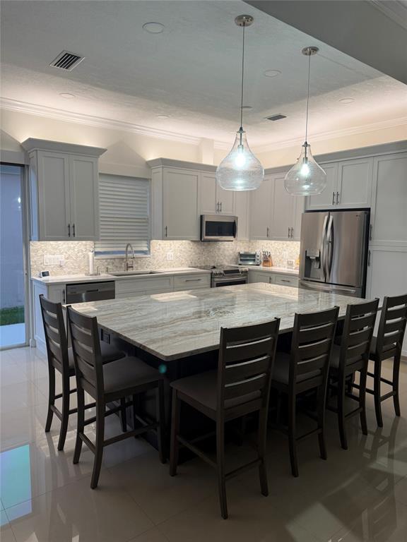 2752 Irma Lake Drive West Palm Beach, FL 33411 - Photo 7 of 38 a kitchen with a table and chairs in it