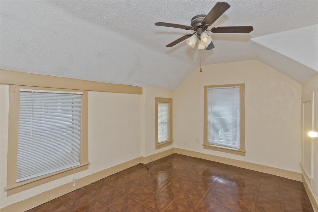33 Forest Street Springfield, MA 01108 - Photo 13 of 39 a view of an empty room with a window