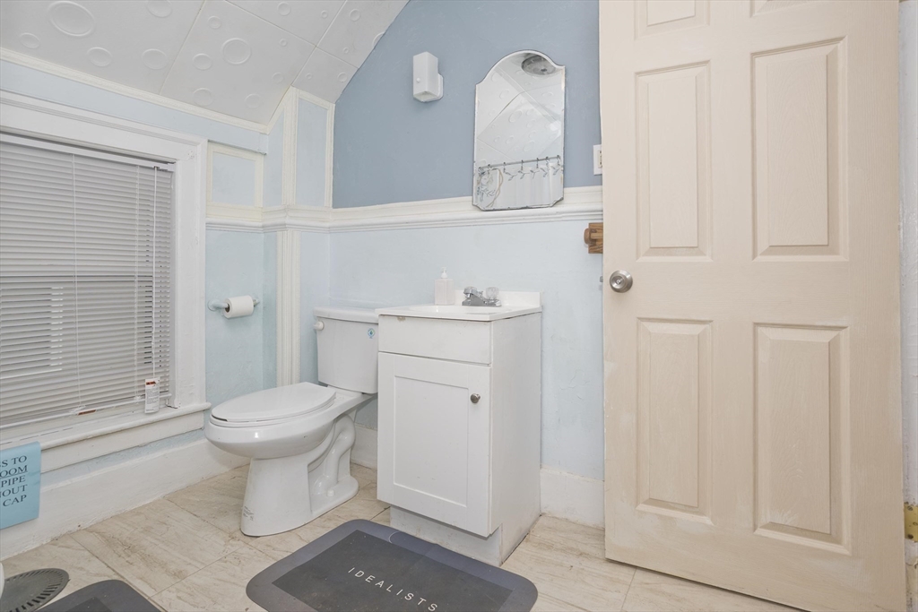 33 Forest Street Springfield, MA 01108 - Photo 21 of 39 a bathroom with a sink toilet and shower