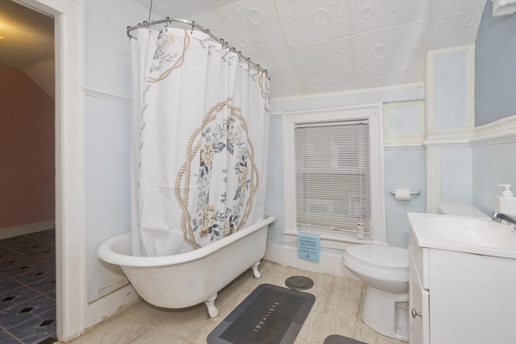 33 Forest Street Springfield, MA 01108 - Photo 22 of 39 a bathroom with a sink toilet and shower