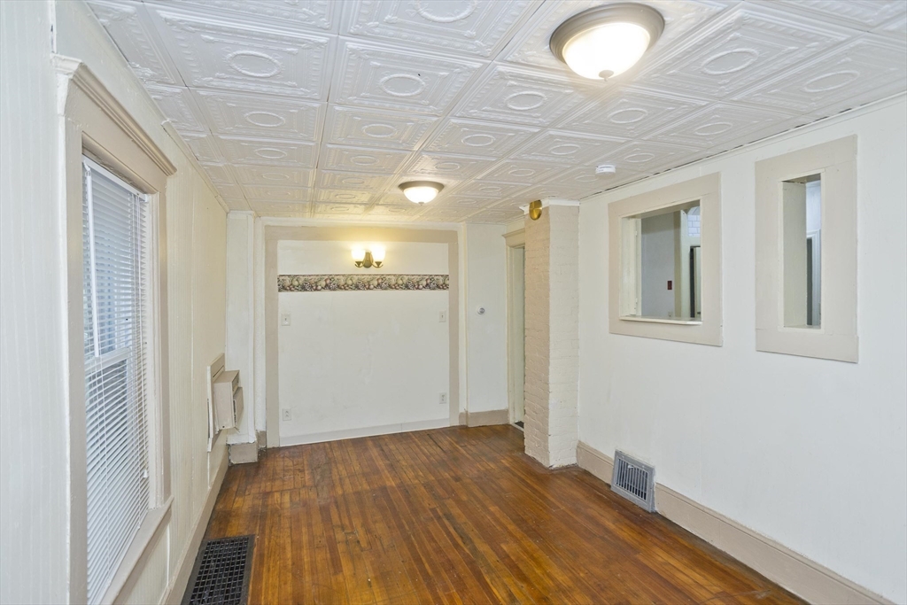 33 Forest Street Springfield, MA 01108 - Photo 30 of 39 a view of empty room with wooden floor