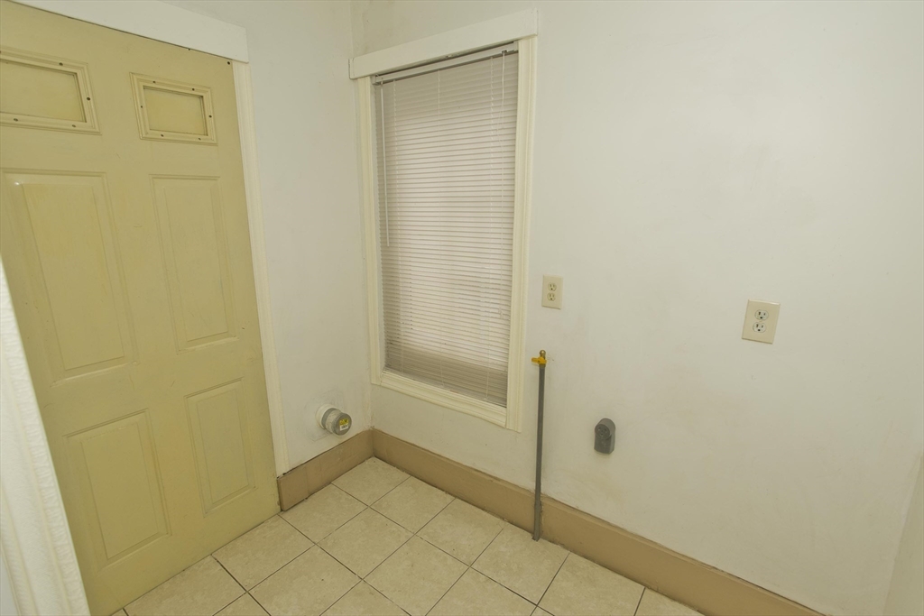 33 Forest Street Springfield, MA 01108 - Photo 36 of 39 a bathroom with a bathtub