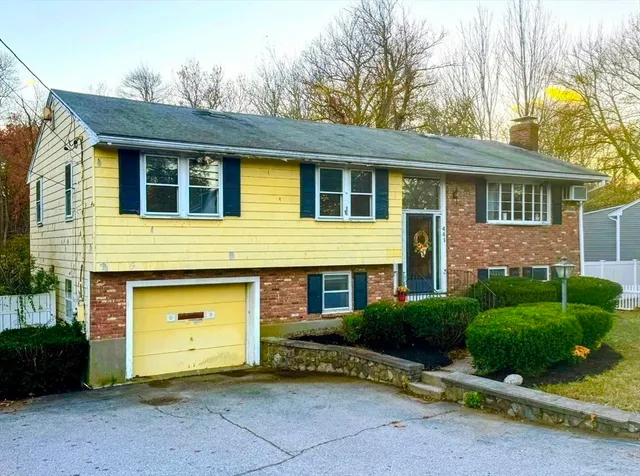 a front view of a house having yard